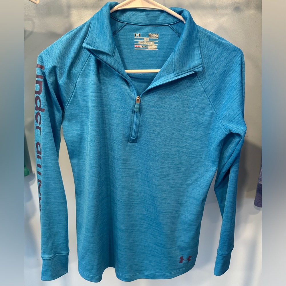 Under Armour 3/4 zip loose fit heat gear. Youth large